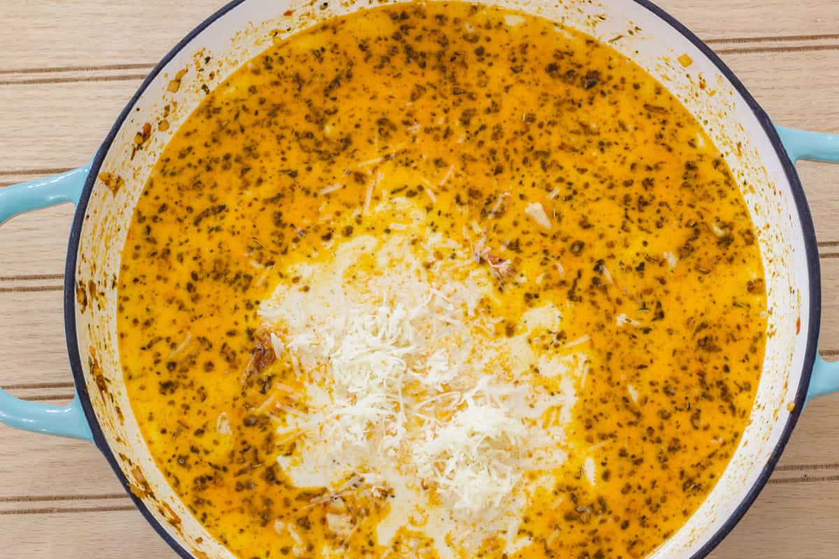 The dish with the heavy cream, chicken broth and parmesan cheese added.