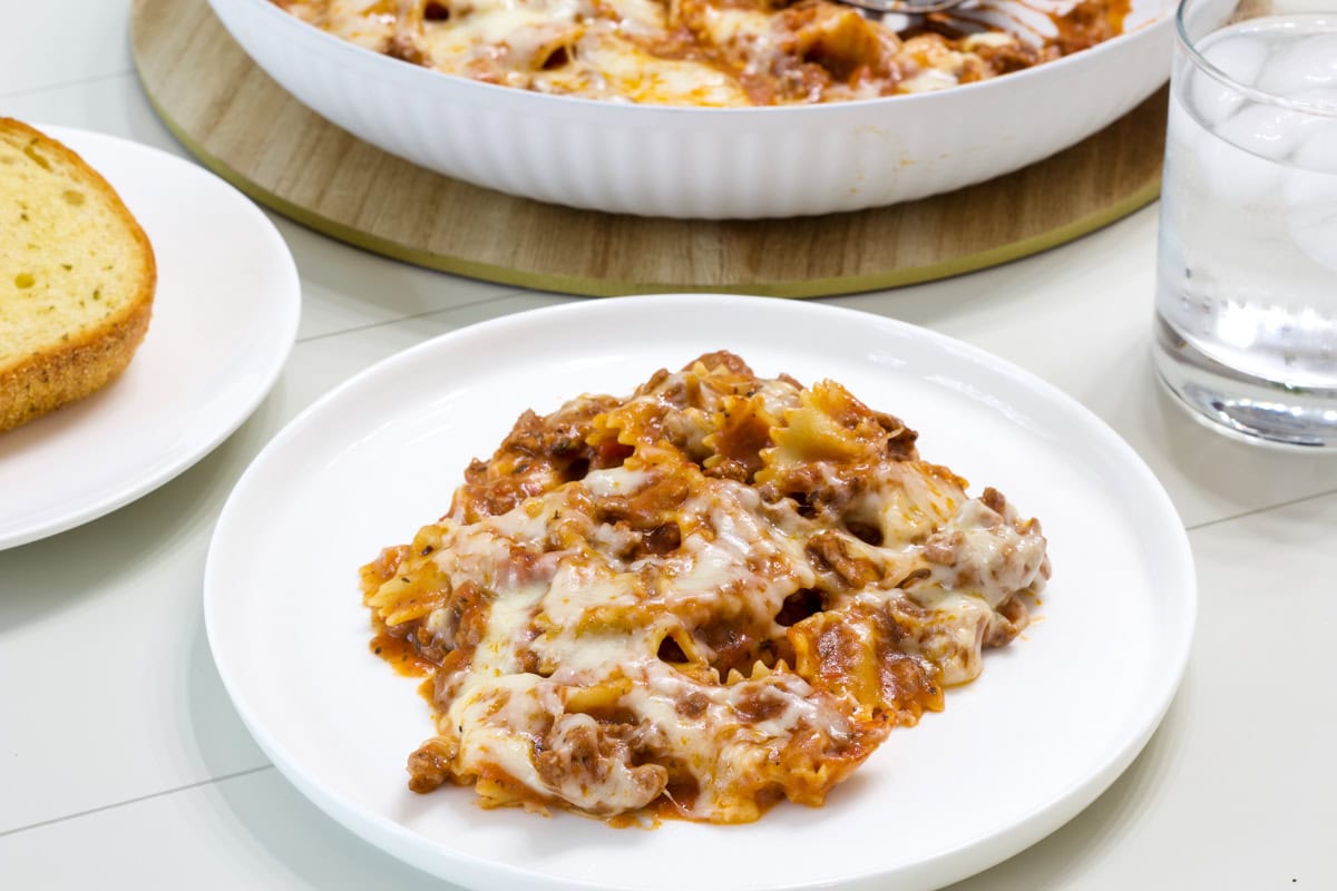 One serving of Homemade Hamburger Helper Lasagna on a white plate.