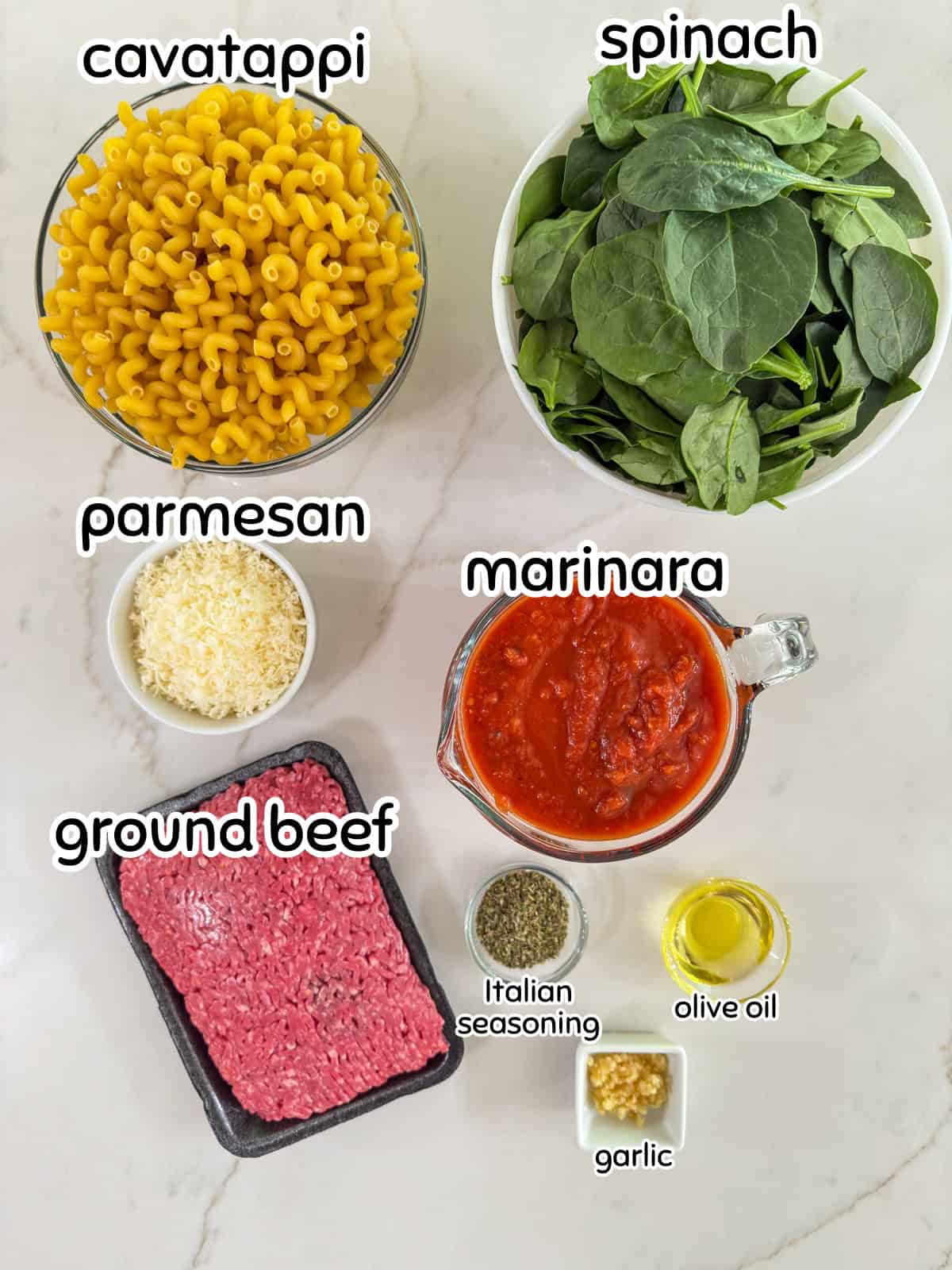 All of the ingredients measured out to make the One Pot Ground Beef & Spinach Pasta recipe.