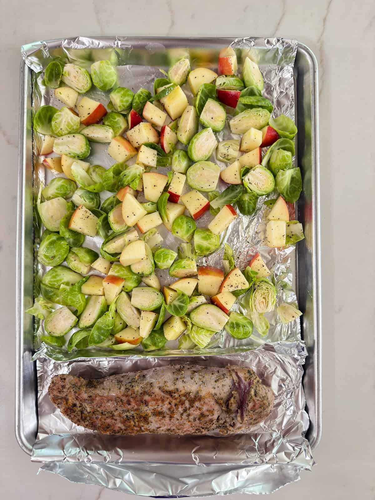 The Pork Tenderloin Brussels Sprouts and Apple Dinner ready to go into the oven.